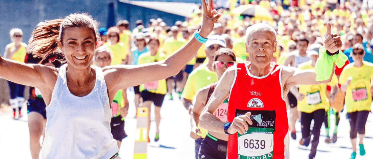 Group of athletes celebrating after a race, showing the impact of turmeric on endurance and recovery.