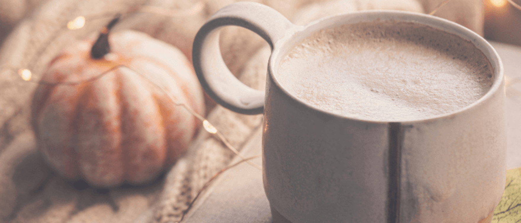 Warm autumn latte with cinnamon and pumpkin for a cozy seasonal detox.