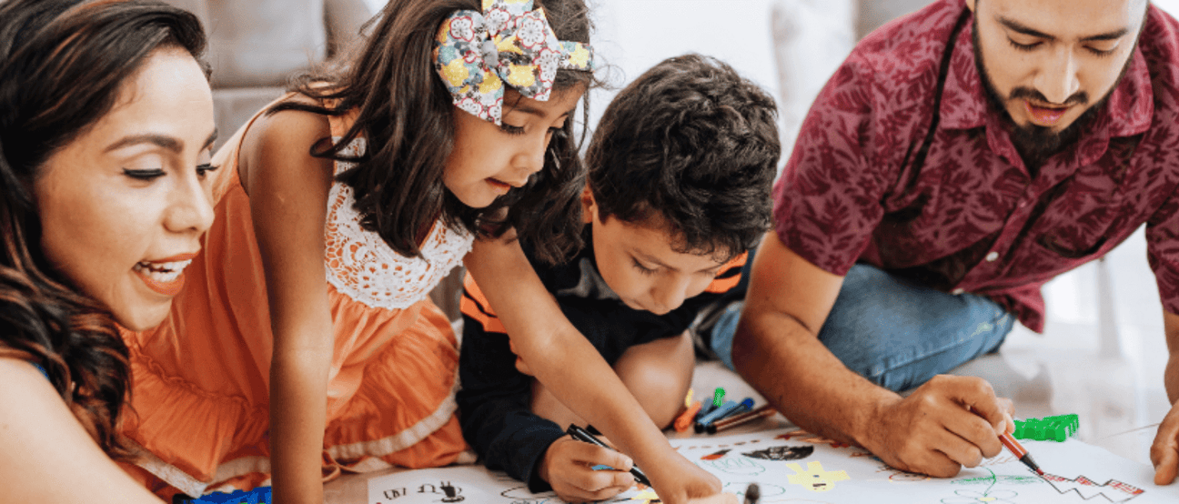 Close-up of a family engaging in a learning activity, emphasizing the benefits of Vitamin D3 + K2 for mental clarity and focus.