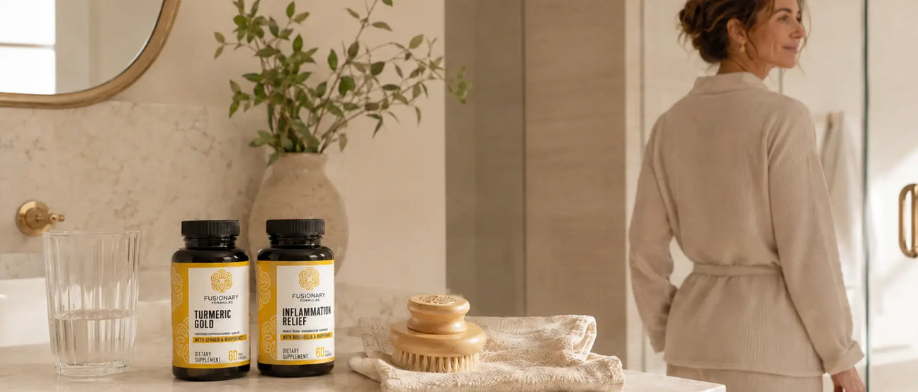 Woman beginning her Fusionary anti-inflammatory morning ritual in a calm, light-filled bathroom with Turmeric Gold and Inflammation Relief supplements