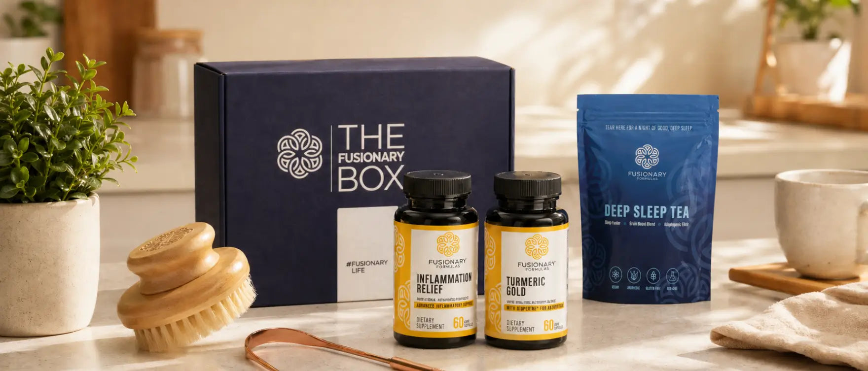 Fusionary Box opened with Turmeric Gold, Inflammation Relief, Deep Sleep Tea, and dry brush tools included in the 30-day starter kit