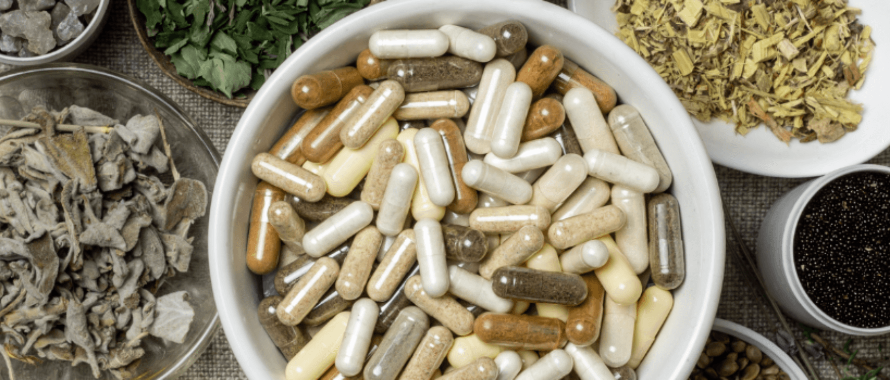 set of natural vitamins and supplements for inflammation relief, including capsules and herbal remedies.