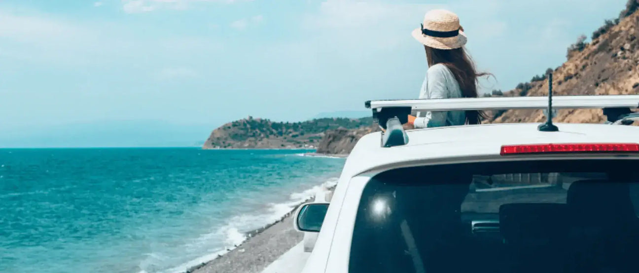 Scenic view of a coastal road during a summer road trip.