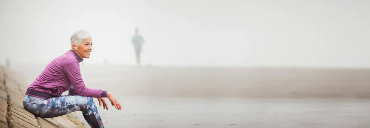 Woman on beach discovering ayurveda